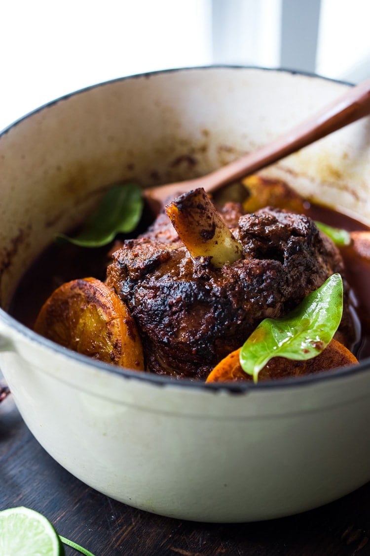 Mexican Lamb Barbacoa - a simple delicious recipe from Oaxaca that results in tender, juicy falling off the bone lamb perfect for tacos and burritos!