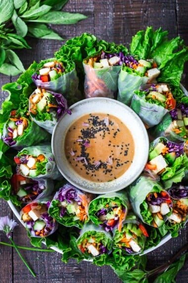 This Fresh Spring Roll recipe is easy to make and comes from our vegetarian restaurant! Served with our favorite homemade peanut sauce- a light, healthy, and delicious meal!