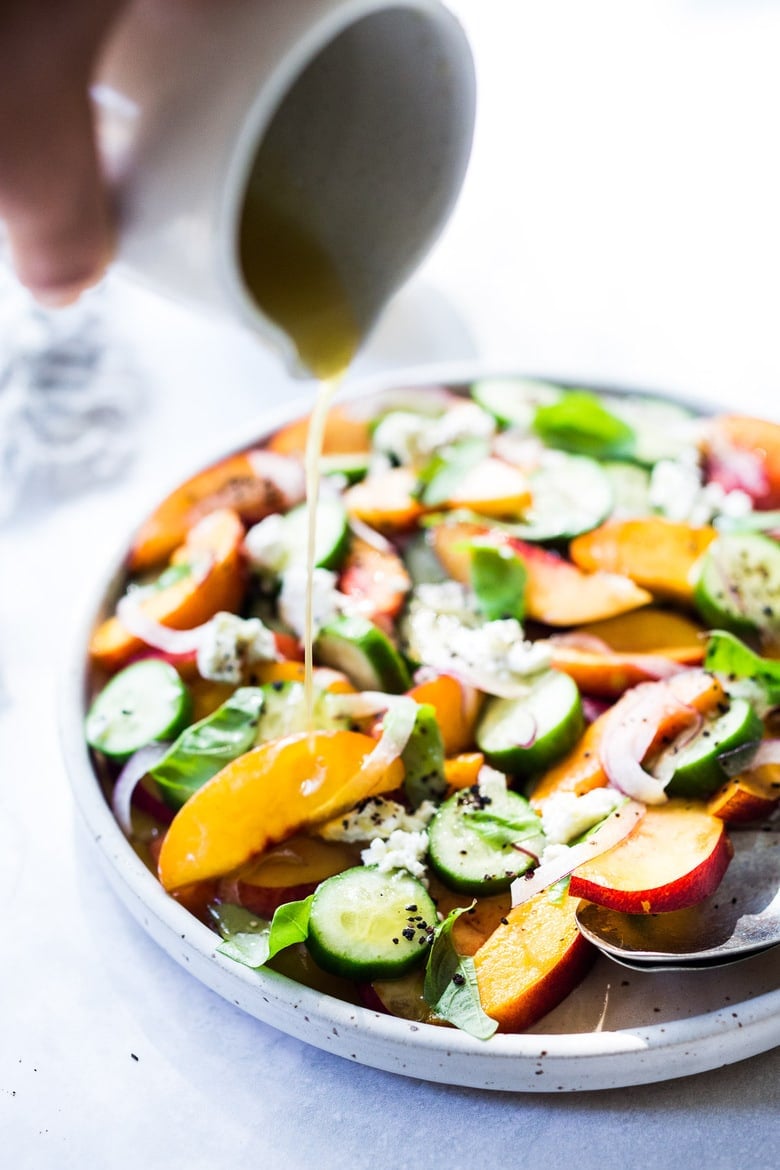 Nectarine Salad with cucumber, Basil, Goats Cheese, Red onion and optional Urfa Biber ( Turkish Chili Pepper). A simple delicious Farmers Market Salad you can put together in minutes! #nectarinesalad #nectarines #nectarinerecipes #farmersmarket #healthysalad #easysalads #cucumbersalad