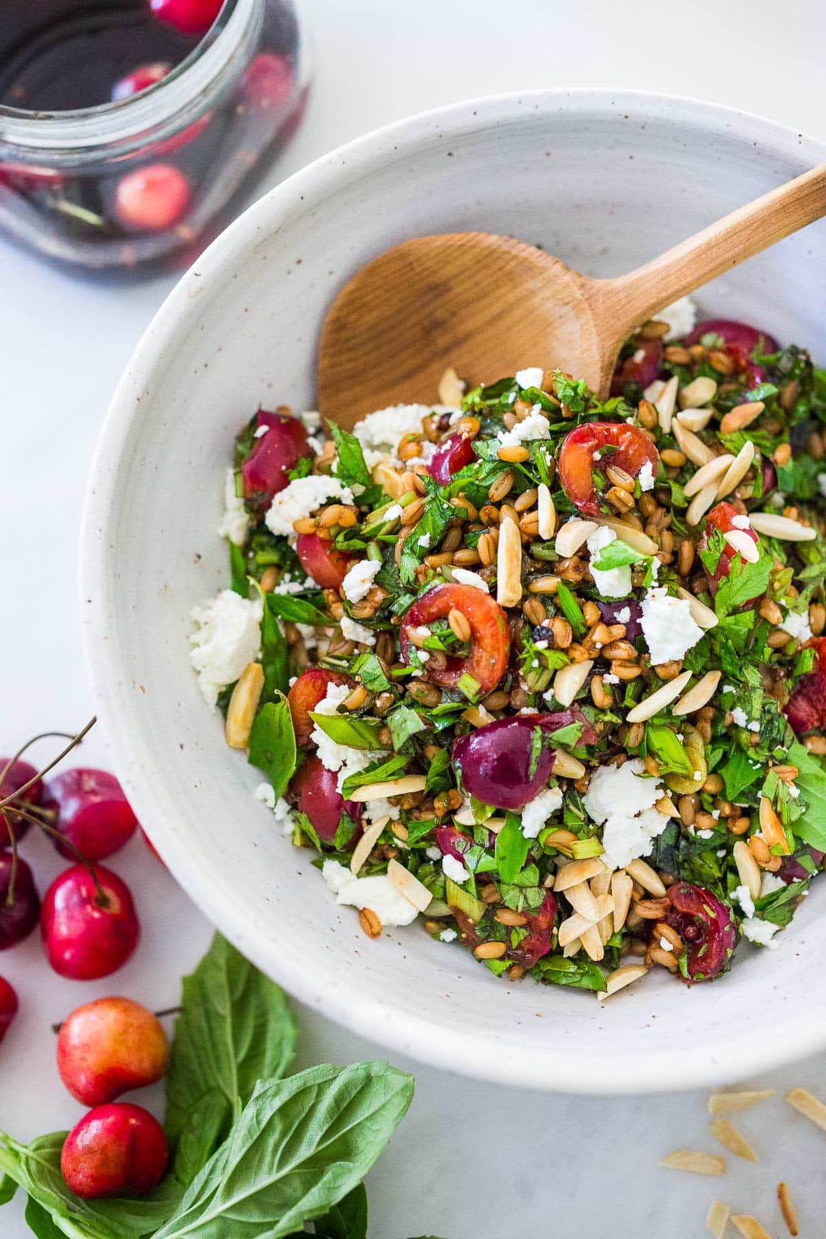 Pickled Cherry and Farro Salad with almonds, fresh herbs and Vanilla- Balsamic Dressing.