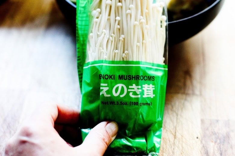 a package of enoki mushrooms.