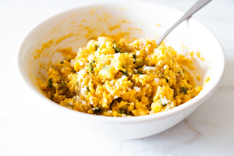 filling ingredients in a bowl. 