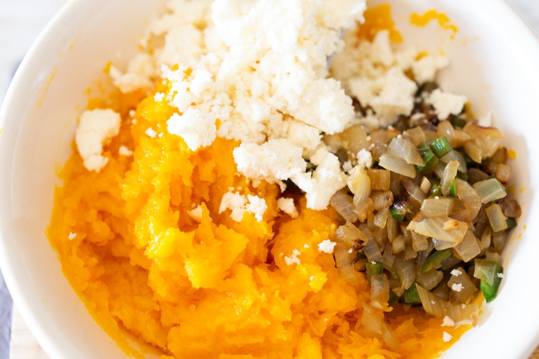mixing the filling ingredients in a bowl. 