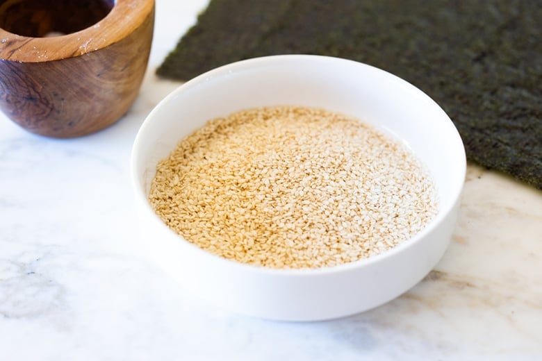 How to make Furikake- a Japanese spice blend made with seaweed, toasted sesame seeds, salt and optional bonito and spices. Use on rice, veggies, fish or avocado toast! Vegan and Gluten-free. #furikake