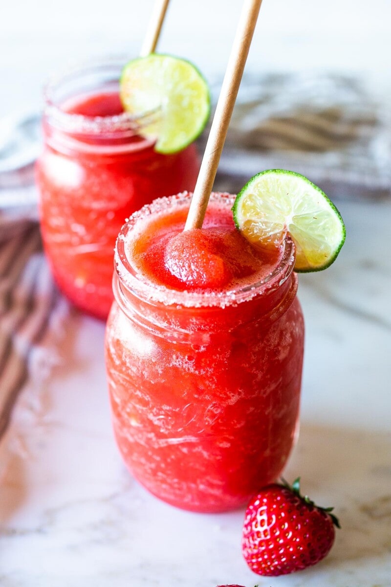 Say hello to the best Strawberry Margaritas made with fresh, ripe, juicy strawberries! These "frozen" Strawberry Margaritas are light and refreshing and go down a little too easily! Naturally sweetened, nicely balanced with the best flavor!