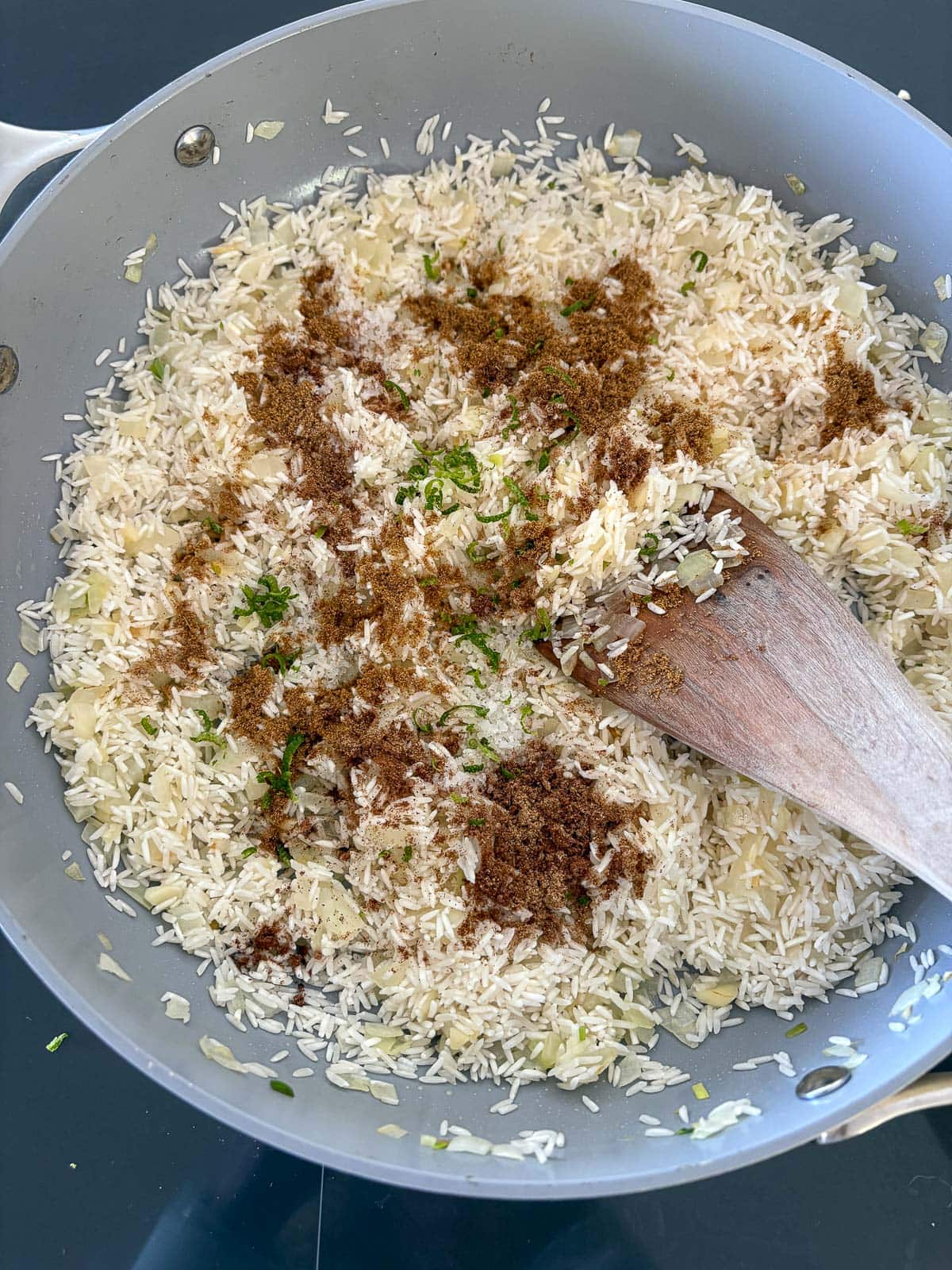 Add lime zest and coriander, cumin and salt.