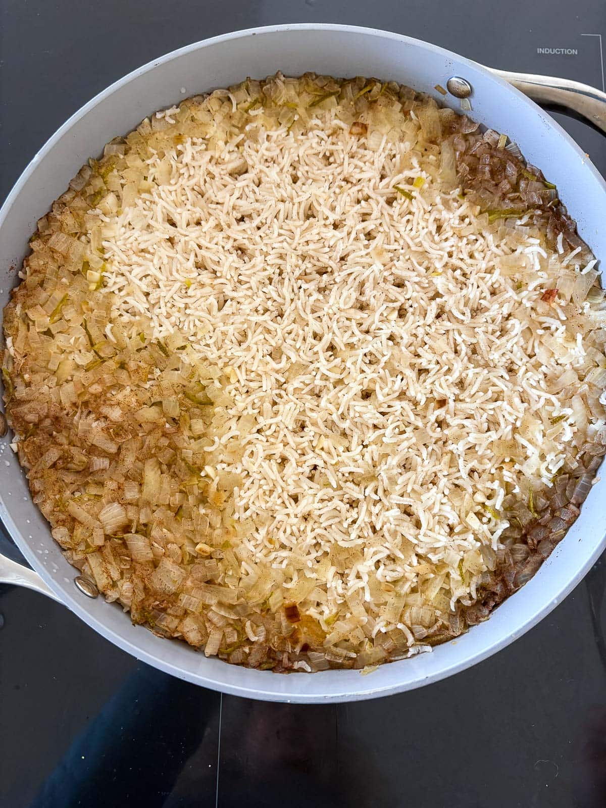 The steamed rice before it is fluffed. 