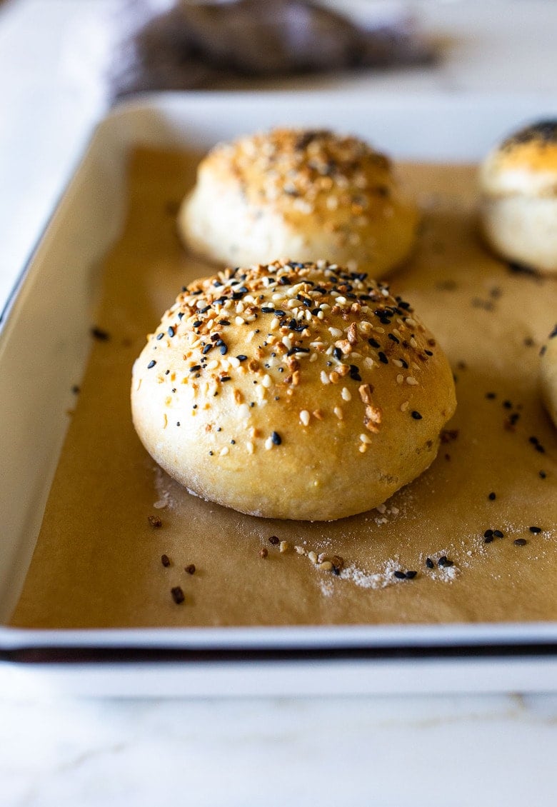 How to make Sourdough Buns with leftover over sourdough starter that are light and airy (like a brioche bun) in about 2 1/2 hours from start to finish, with only 20 minutes of hands-on time.