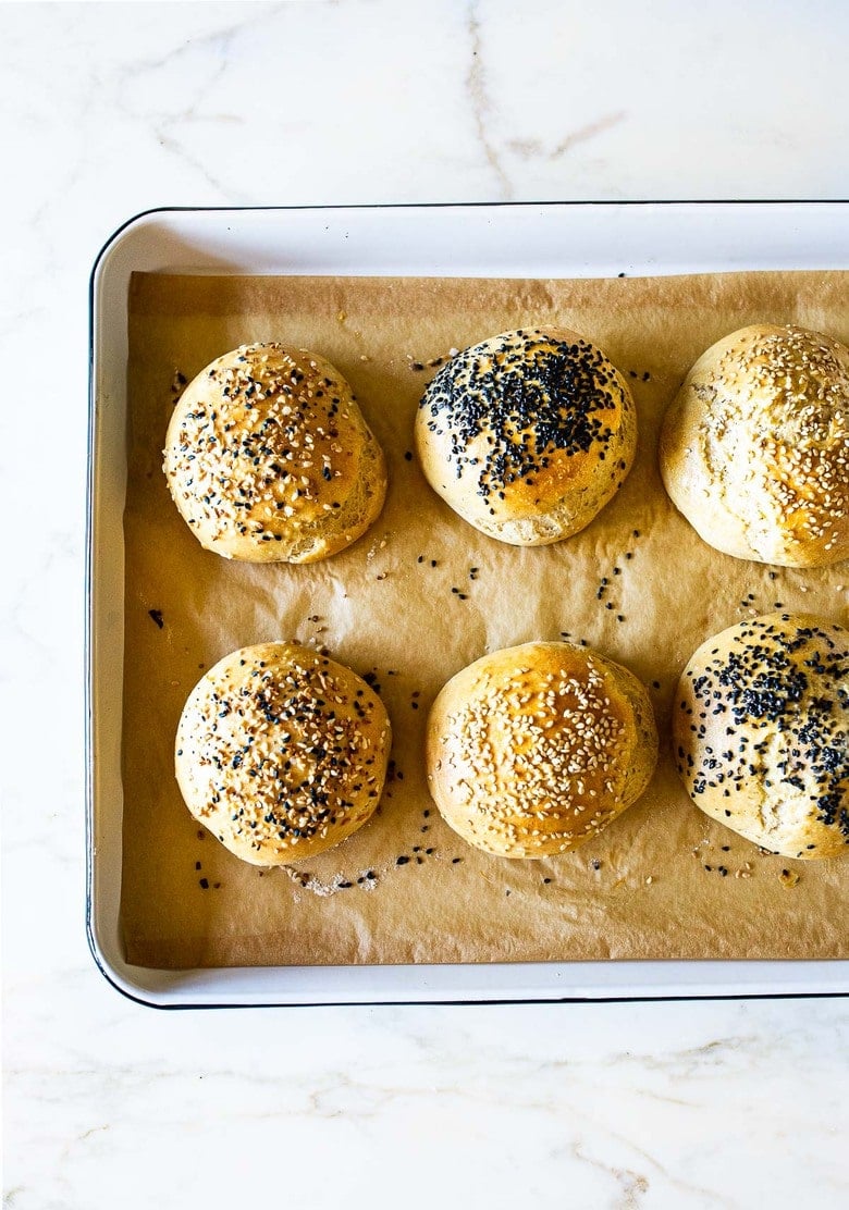 How to make Sourdough Buns with leftover over sourdough starter that are light and airy (like a brioche bun) in about 2 1/2 hours from start to finish, with only 20 minutes of hands-on time.