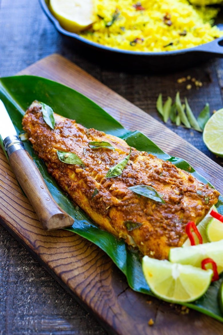 Here's a simple yet super flavorful recipe for Kerala-Style Fish, made with a flavorful paste that is either grilled or roasted in the oven. Curry leaves and Tamarind give this Indian Recipe its unique flavor. #kerala #keralafish #whitefish #indianrecipes
