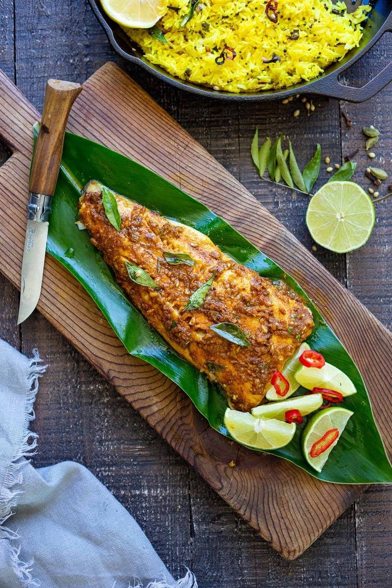 Our 50 Best Grilling Recipes | Kerala-Style Fish, made with a flavorful paste that is either grilled or roasted in the oven. Curry leaves and Tamarind give this Indian Recipe its unique flavor. #kerala #keralafish #whitefish #indianrecipes