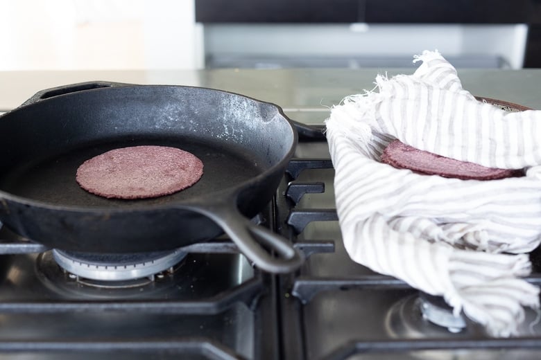 wrapping the tortillas in a towel.