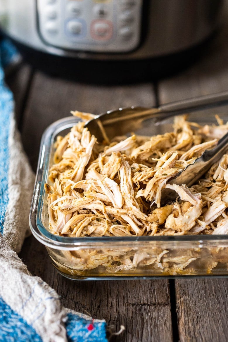 A simple easy recipe for Shredded chicken that can be made in an Instant Pot, Slow Cooker or on the Stovetop. Use breasts or thighs, fresh or frozen, great for meal prep and busy weeknight dinners. Keeps for 5 days in the fridge, or freeze! #shreddedchicken