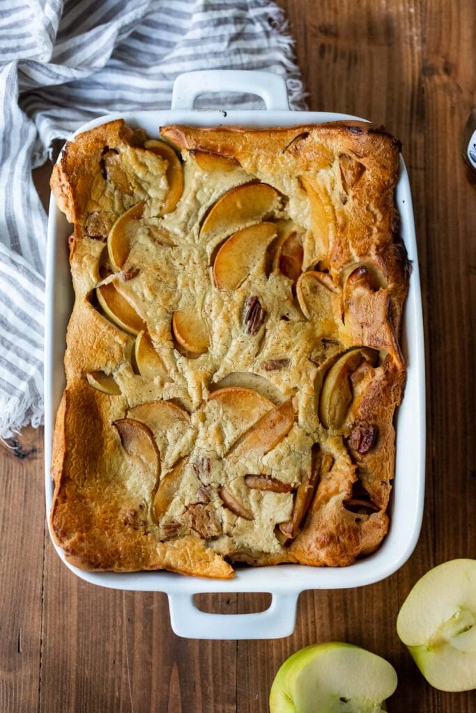 baked apple pannekoeken in casserole dish.