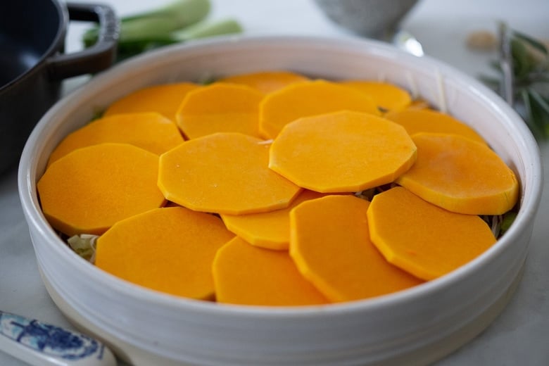 the top layer of the butternut squash gratin with thin, round slices. 