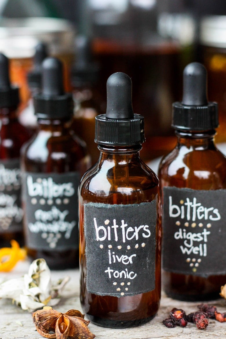 homemade bitters in bottles with labels.