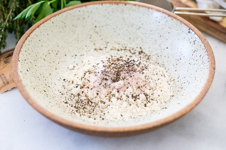 bowl of flour, salt, pepper 