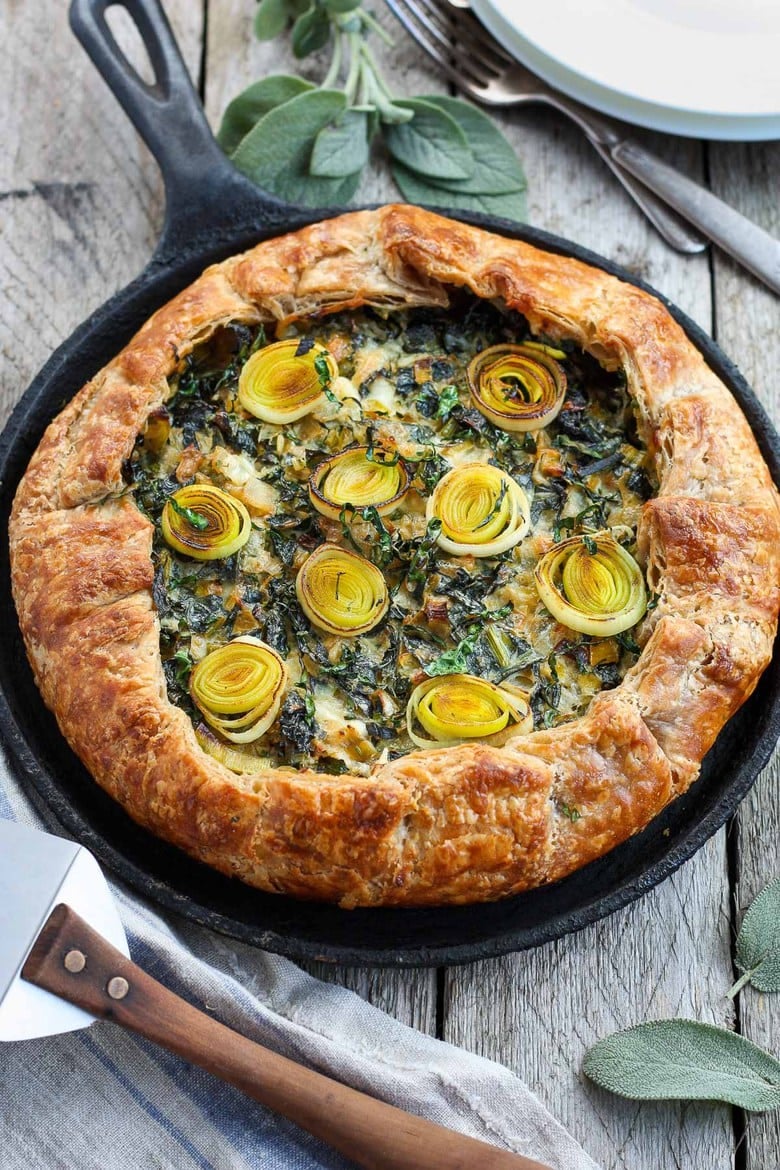 A Savory Galette filled with a luscious mixture of leeks, kale and mascarpone, enclosed in a free-formed, tender, extra flakey crust.
