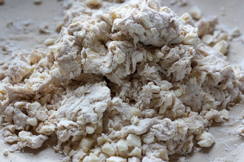 how to make galette dough craggy, rough dough combined on parchment.