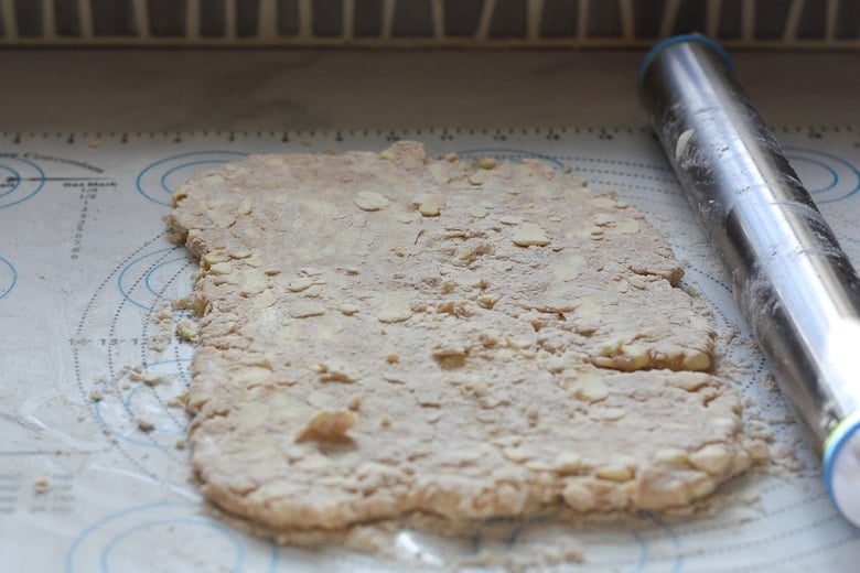 rectangle of puff pastry dough with shaggy texture.