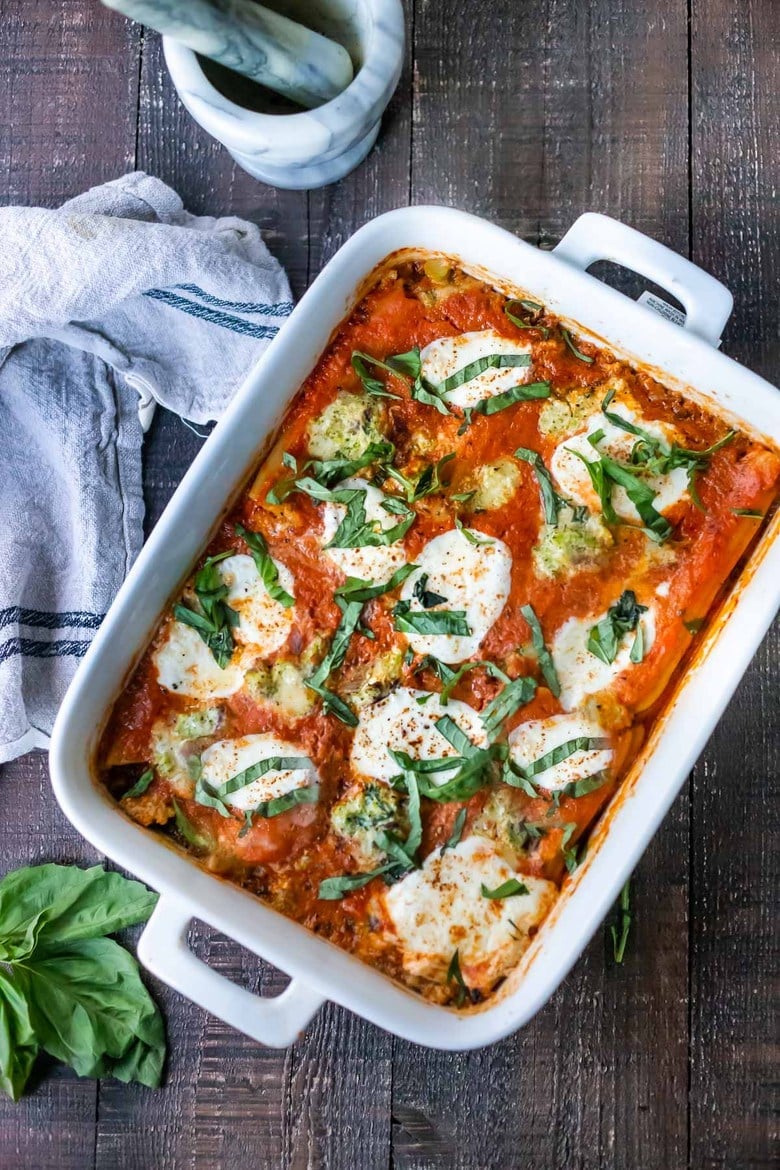 You will love how easy this baked manicotti recipe is! A no-boil version made with creamy broccoli cheese filling and a quick tomato sauce.