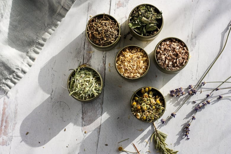 bowls of herbs, herbal tea ingredients.