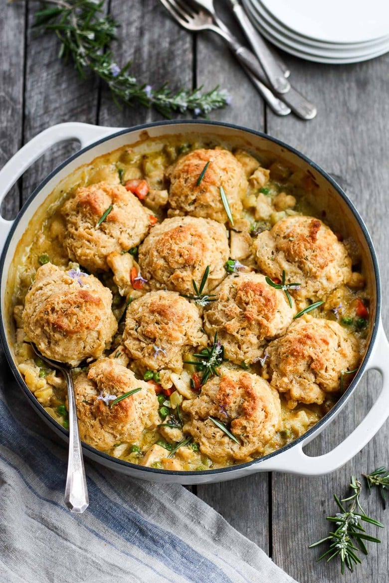How to make Classic Chicken Pot Pie with a quick and easy biscuit crust, tender veggies, fresh herbs, in a creamy wine sauce. #potpie