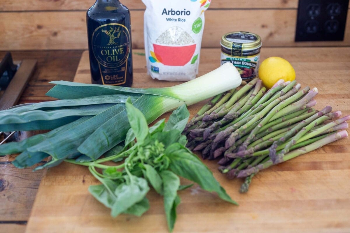 Asparagus risotto ingredients: asparagus. arborio rice, lemon basil olive oil and veggie broth.