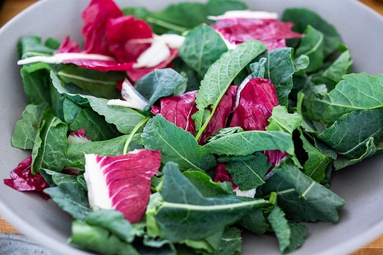 baby kale in a bowl with radiccio.