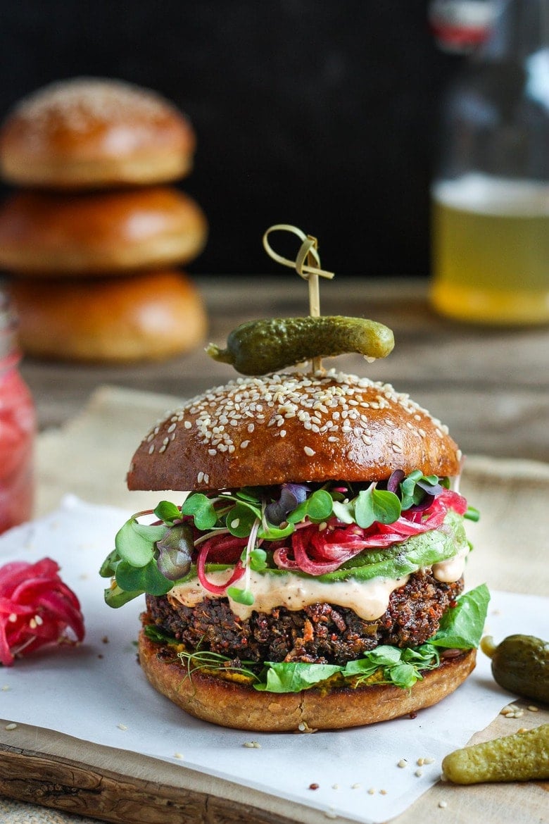 Packed with nutritious ingredients, this Chickpea Quinoa Veggie Burger is full of savory delicious flavor and satisfying texture. Great with a variety of toppings. Vegetarian and Gluten-free, Vegan-adaptable! #veggieburger #chickpeaburger