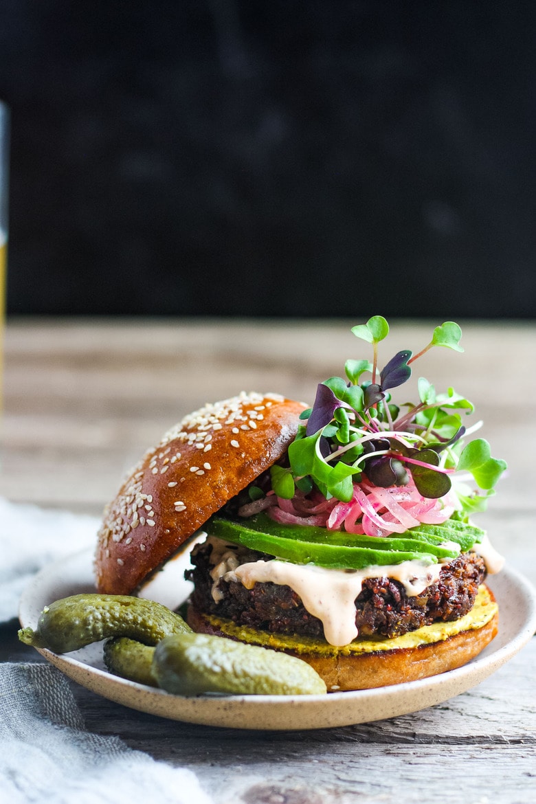 Packed with nutritious ingredients, this Chickpea Quinoa Veggie Burger is full of savory delicious flavor and satisfying texture. Great with a variety of toppings. Vegetarian and Gluten-free, Vegan-adaptable! #veggieburger #chickpeaburger