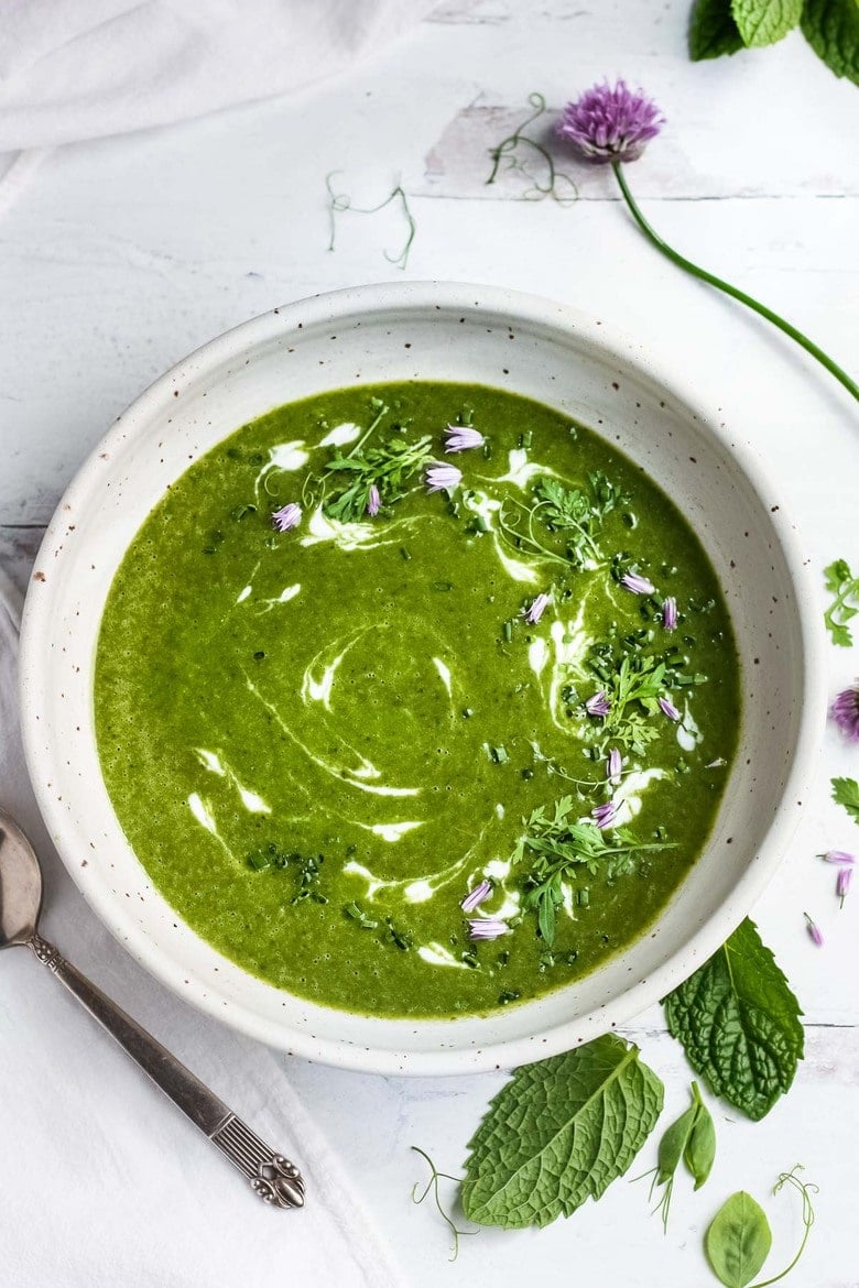 Creamy Vegan Spinach Soup, velvety smooth with a refreshing hint of mint. Simple clean ingredients create a deeply nourishing and delicious soup that is dairy-free. Vegan and Gluten-free. Serve warm or chilled. #spinachsoup