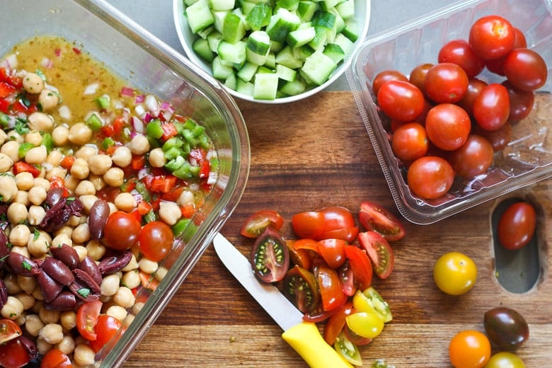 Add veggies to the dressing as you chop them