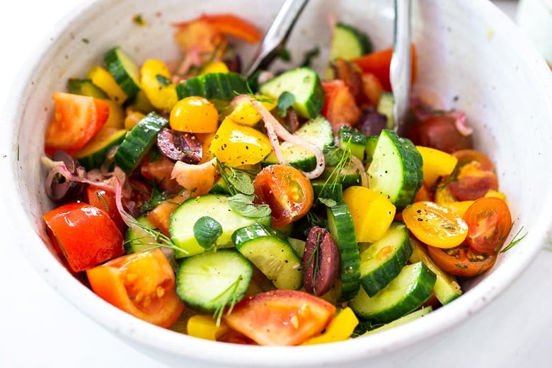 toss the Greek Salad ingredients to combine