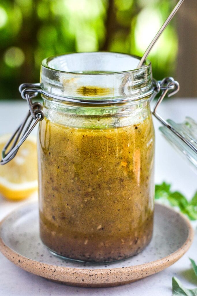 Quick and healthy Greek Salad Dressing is delicious, easy to make and so versatile. A tasty perk for vegetable salads, pasta salad, chicken marinade and more!
