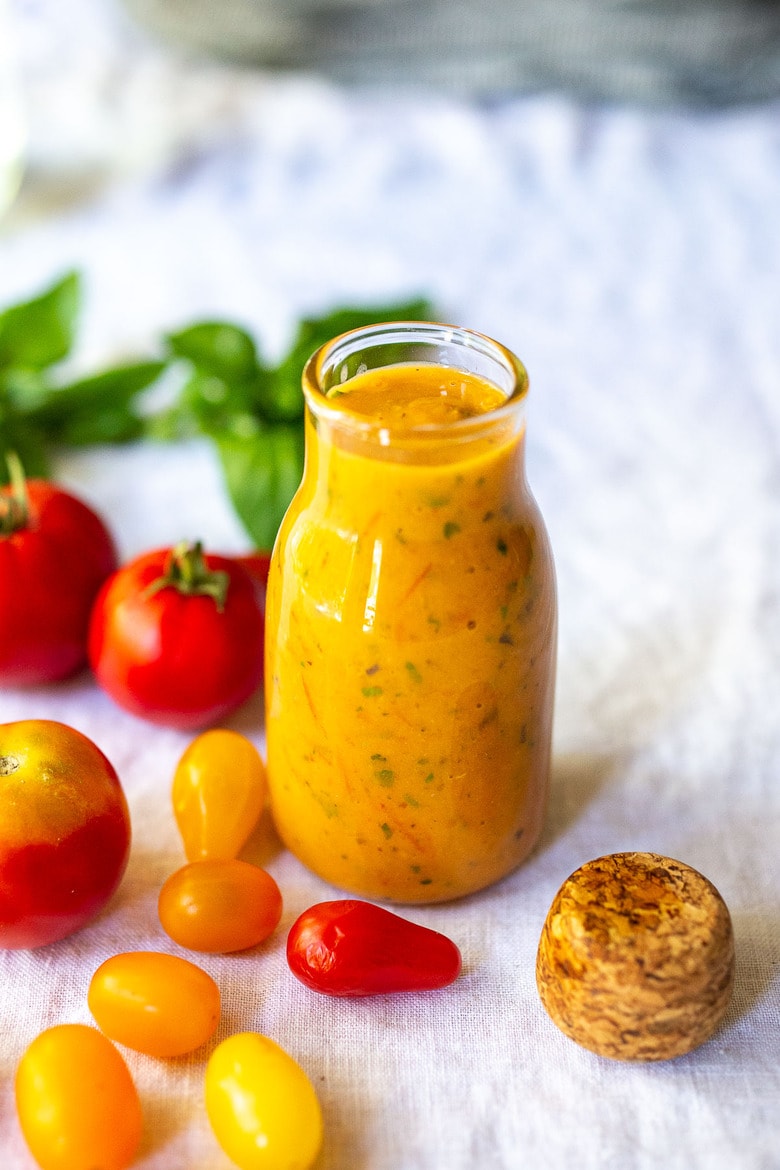 This summery recipe for Tomato Vinaigrette is delicious on salads, or spooned over fish or chicken, or even used as a marinade for grilling! #tomatovinaigrette