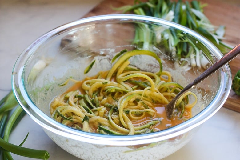 mixing vegetables and batter