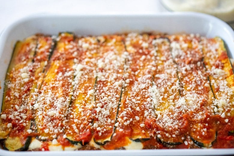Final layer of marinara over the zucchini, sprinkled with pecorino.
