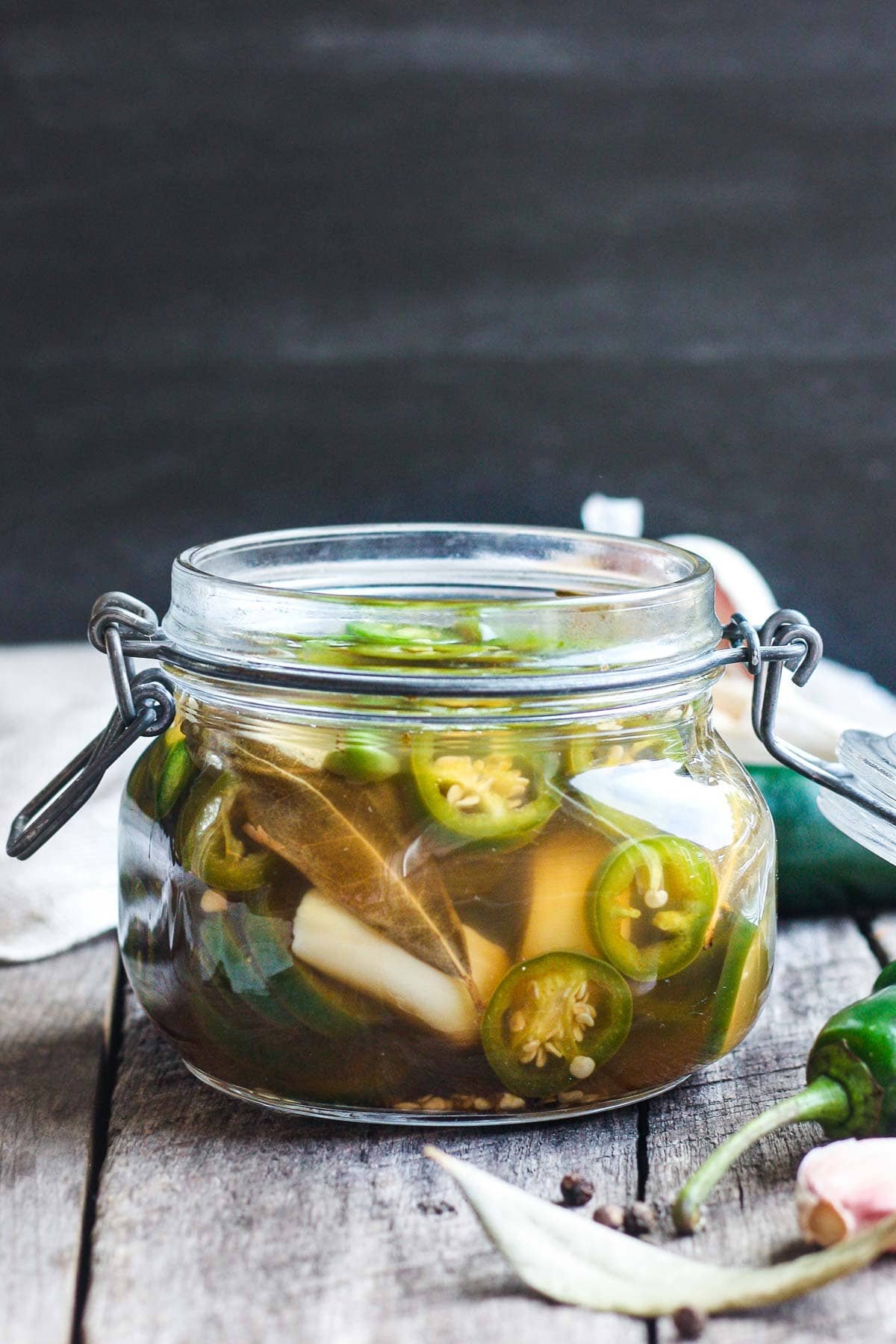pickled jalapeno peppers in a pint jar.
