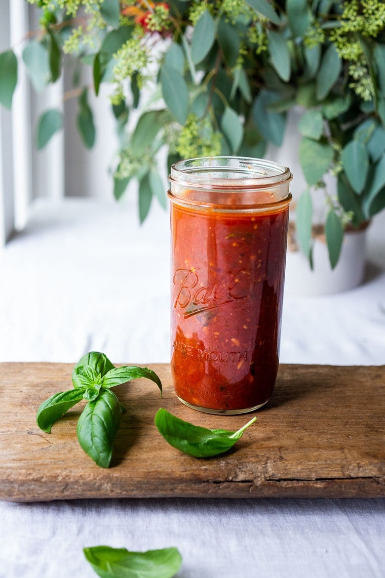 A fast and easy recipe for Marinara Sauce using fresh or canned tomatoes, with garlic, onions and oregano and basil cooked on the stovetop in under 30 minutes. Use this classic Marinara Sauce on pasta, pizza or meatballs. Freeze for the winter months!