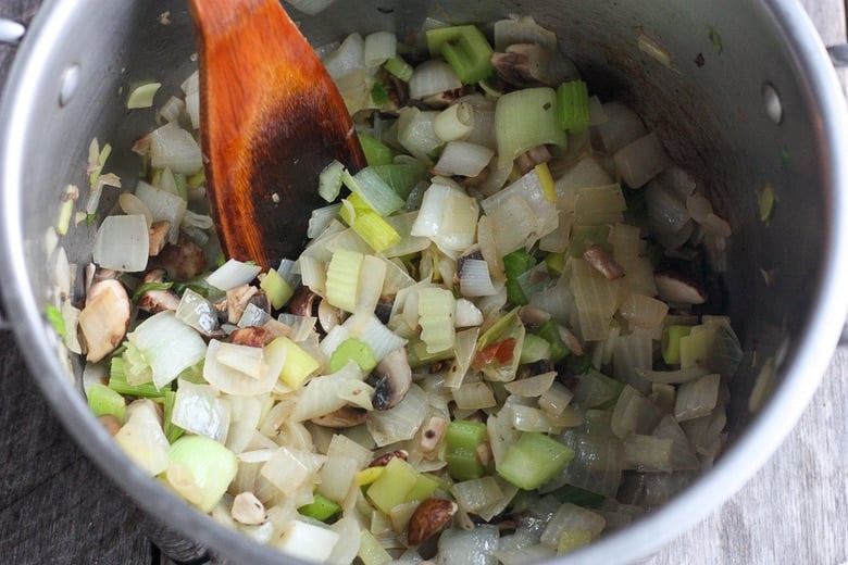 sauteing vegetables in pot.