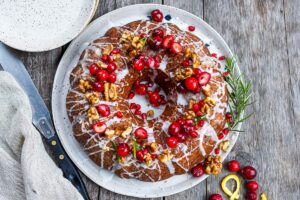 Vegan Cranberry Cake scented with orange and toasty walnuts has a light and tender crumb with just the right balance of sweet and tart. Festive and delicious, a perfect holiday dessert!
