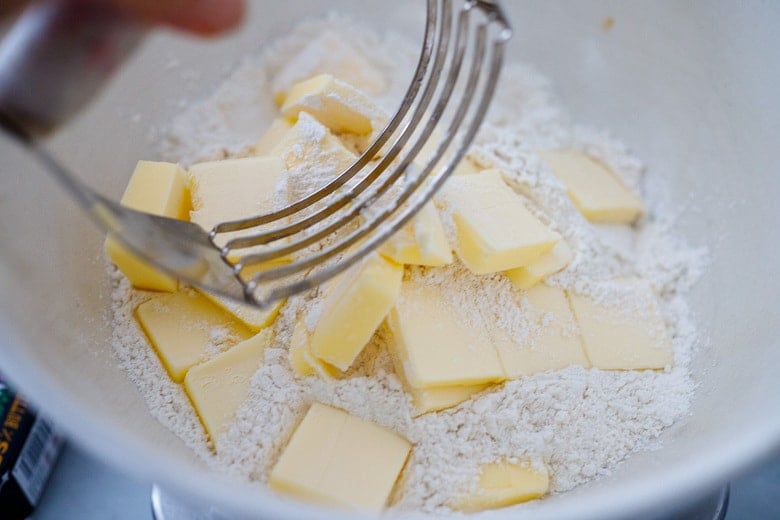 slice the butter and add to flour