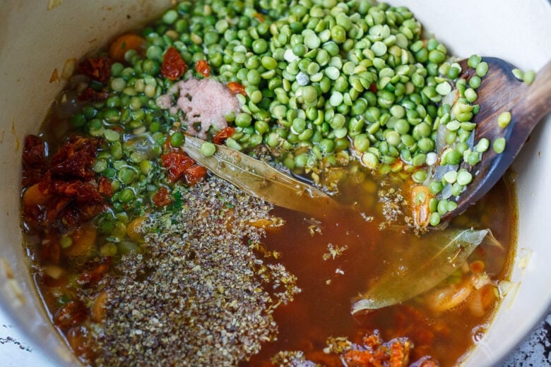 split pea soup with seasonings in a pot. 