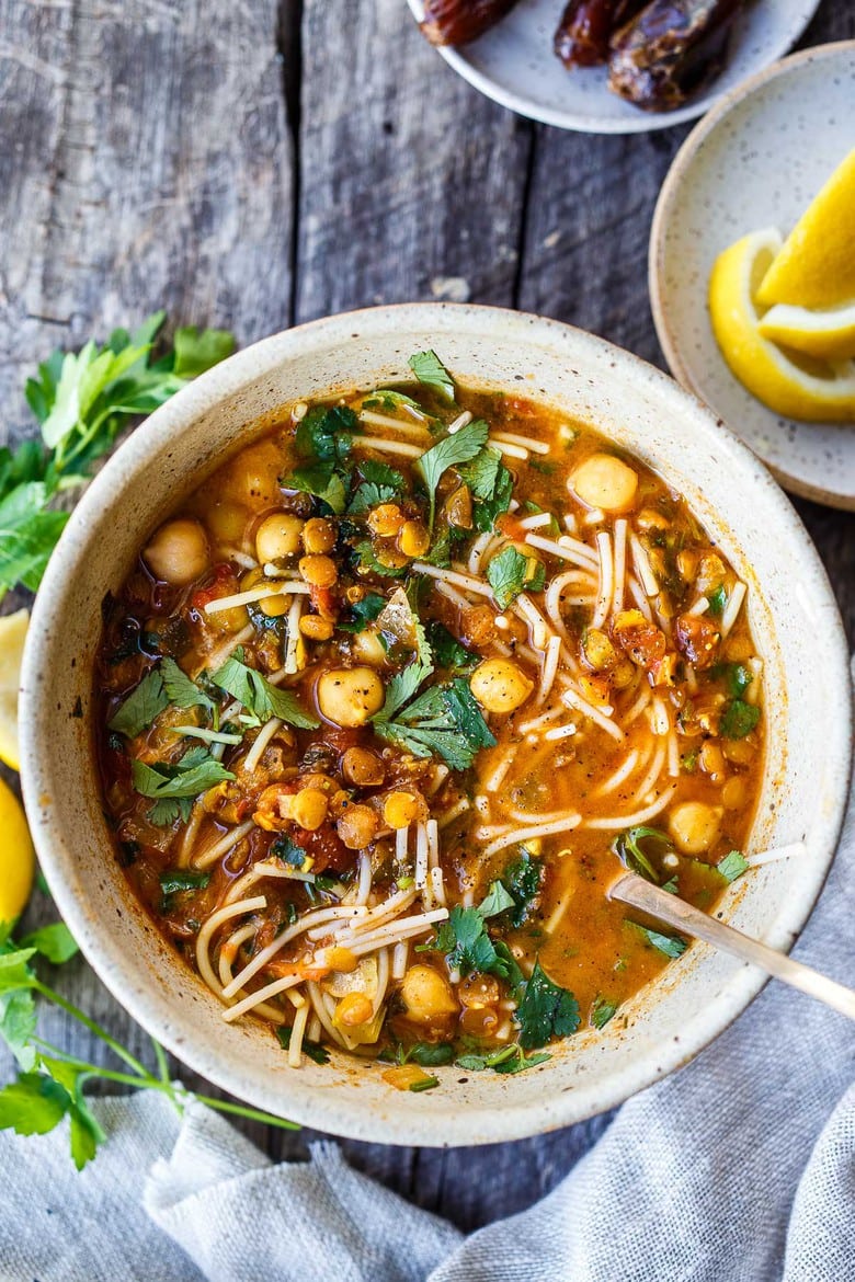 Moroccan Lentil and Chickpea Soup (aka Harira) is hearty, full of protein and loaded with nutrients. Warming fragrant spices make this healthy one-pot meal deeply flavorful! Vegan and Gluten-Free adaptable.