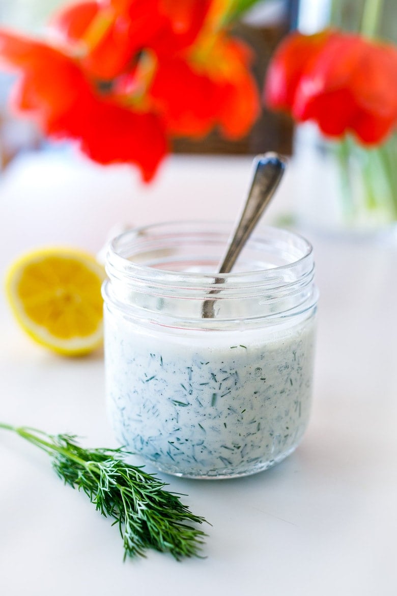 How to make the creamiest Ranch Dressing from scratch loaded up with fresh dill- this easy recipe is creamy, tangy, peppery, and full of flavor!