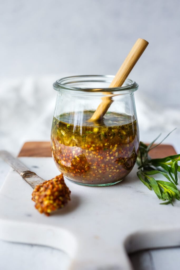 Bright and tangy, this Mustard Seed Maple Dressing with tarragon and shallots is the perfect complement to roasted or grilled veggies and hearty salads. Easy, quick, and Vegan!
