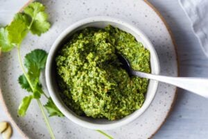Fresh and lively, Cilantro Pesto is full of zippy flavor and totally adaptable! Toss with pasta, spread on bread, or serve with soups, grilled salmon, beans and eggs. Healthy and easy to make!