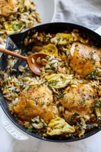 One Skillet Creamy Orzo Chicken with Artichoke Hearts- a deliciously cozy dinner, made with simple pantry ingredients, perfect for busy weeknights.