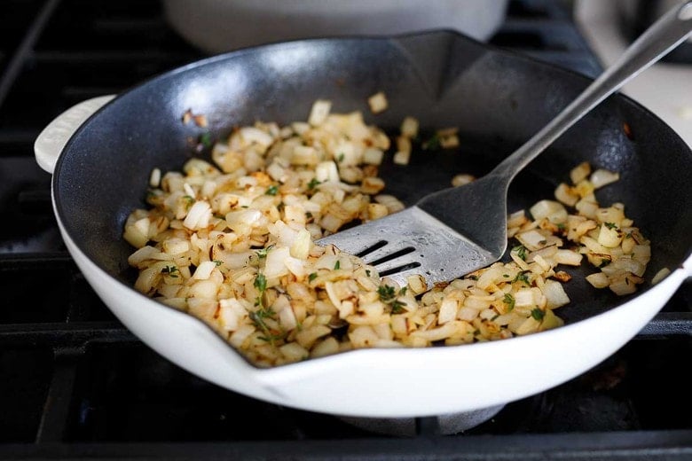 satute the onions and garlic and thyme